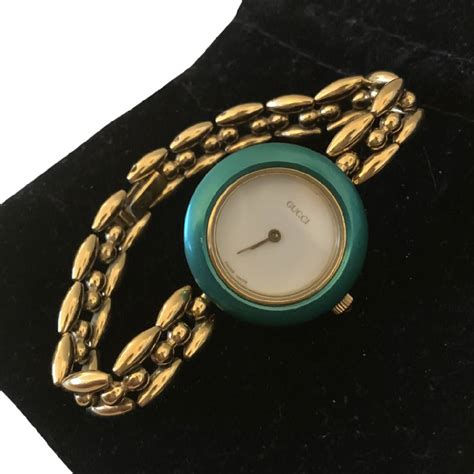 gucci vintage watch changeable bezel.